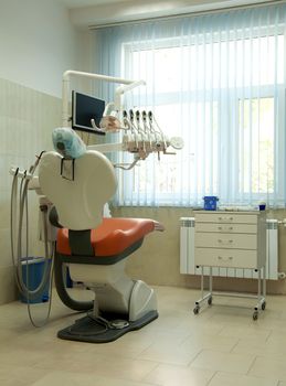 Dental surgery equipment. Chair and lighting