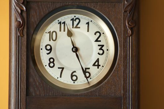 Old antique clocks close up and blurred background clocks