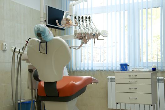 Dental surgery equipment. Chair and lighting