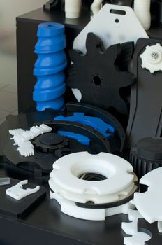 Plastic machine parts. Vertical imagel