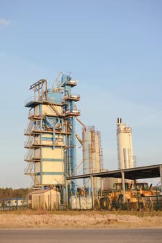 Modern industrial exterior building over blue sky
