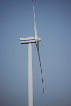 wind trubine at sunny day with blue sky