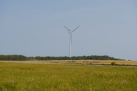 wind trubine at sunny day with blue sky