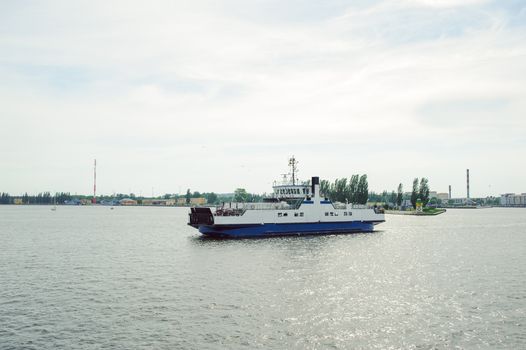 cruise ferry ship sailing in still water