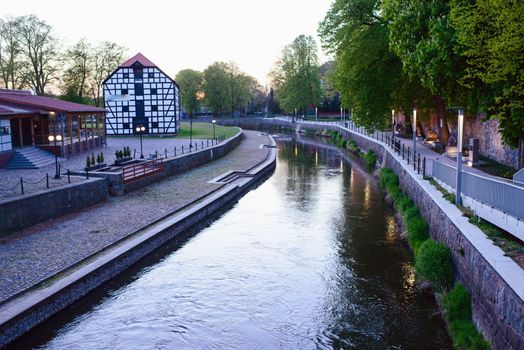 Small river in the city in spring