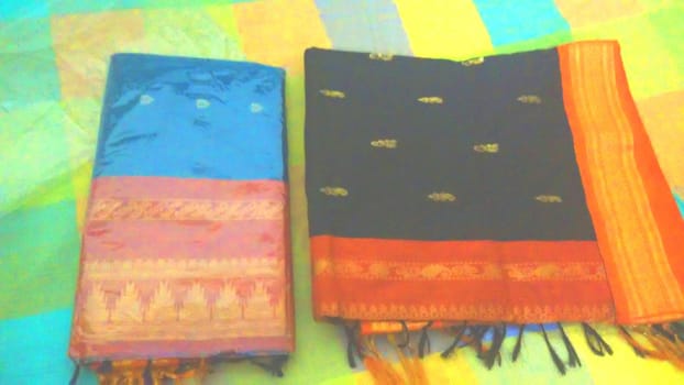 comparing two saris