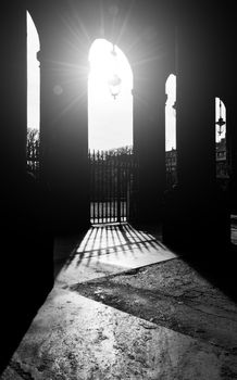 The Palais-Royal arcades in Paris, France. Black and white photography.
