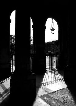 The Palais-Royal arcades in Paris, France. Black and white photography.