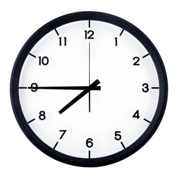 Classic analog clock pointing at seven forty five o'clock, isolated on white background.