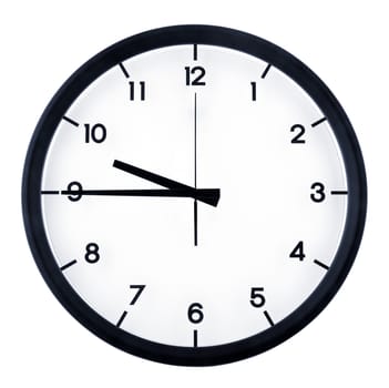 Classic analog clock pointing at nine forty five o'clock, isolated on white background.
