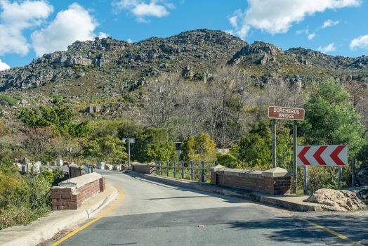A single lane road bridge, called Borcherds Bridge, the historic Bains Kloof Pass in the Western Cape Province