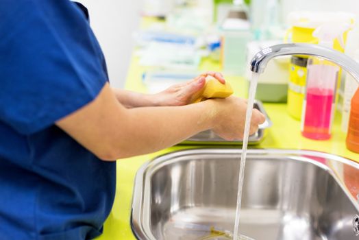 surgeon washing hands before operating