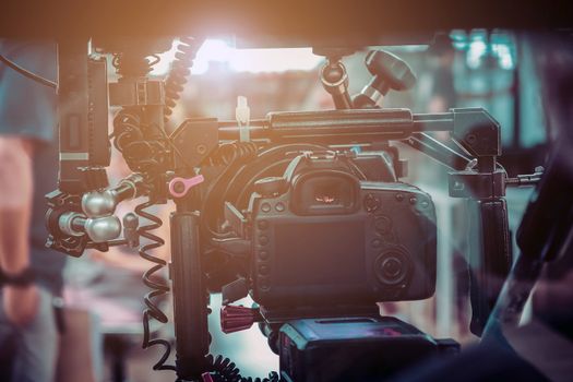 Film industry. Filming with professional camera background