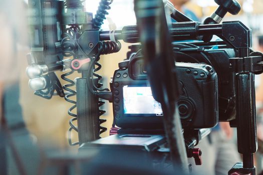 Film industry. Filming with professional camera background
