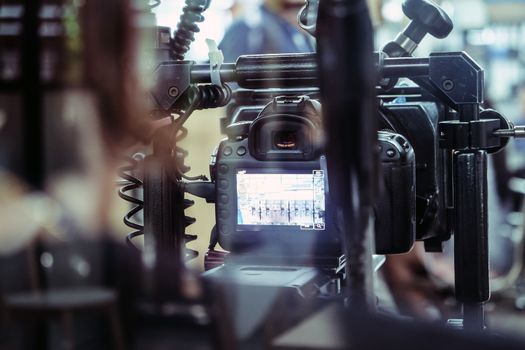 Film industry. Filming with professional camera background