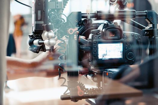 Film industry. Filming with professional camera background