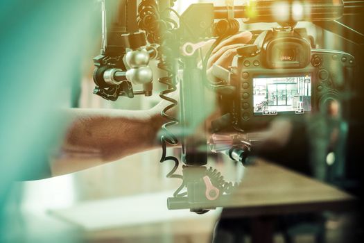 Film industry. Filming with professional camera background