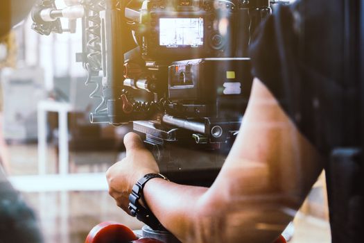 Film industry. Filming with professional camera background