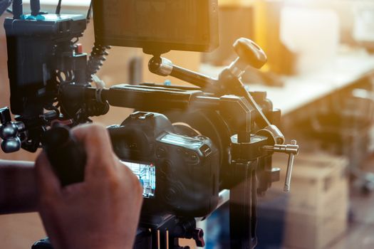 Film industry. Filming with professional camera background