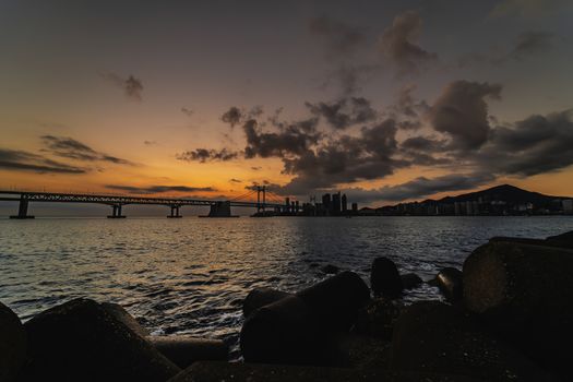 Gwangan Bridge and Haeundae at Sunrise, Busan City, South Korea.