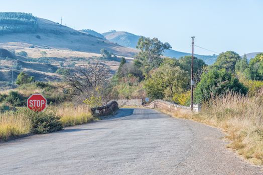 The historic Joubert Bridge, in Pilgrims Rest in Mpumalanga. A stop sign is visible