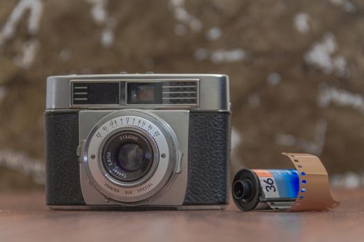 Antique Vintage Old Film Camera on organic background