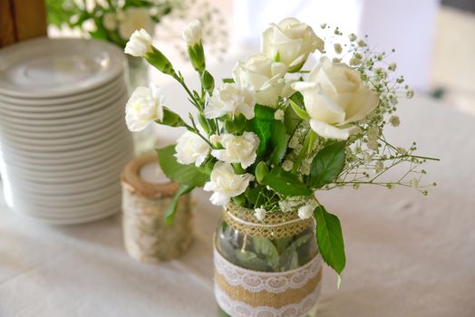 Wedding table set for fine dining or other catered event, center-piece