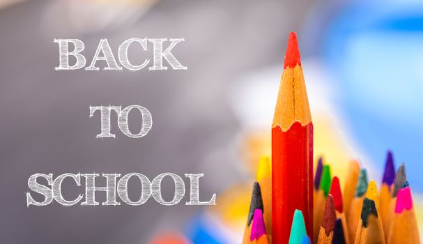 Back to school, Red pencil standing out from crowd, plenty business success concept