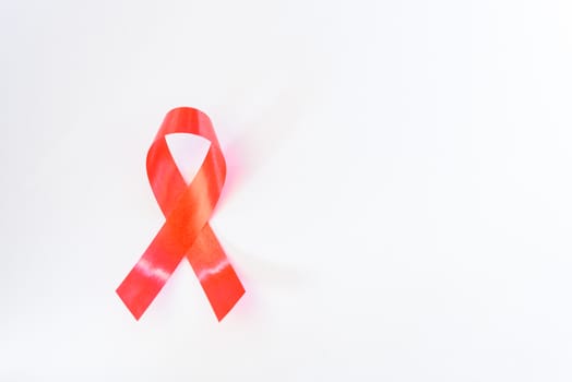 Red Ribbon Support HIV, AIDS on white background and copy space for use