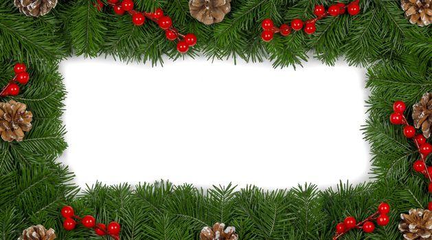 Natural fir Christmas tree branches frame, cones and red berries isolated on white , copy space for text