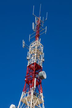 Communications tower with a beautiful blue sky on Puerto Real, Cadiz, Spain