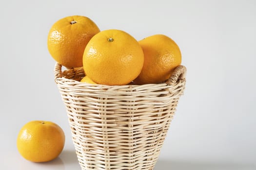 Fresh juicy orange fruit set over white background - tropical orange fruit for background use