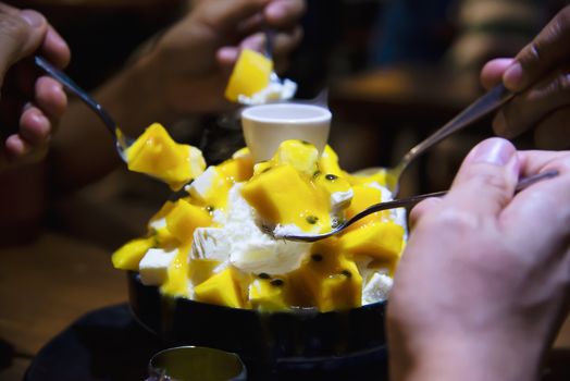 People eating bingsu sweet dessert - people with Korean style sweet dessert for background use