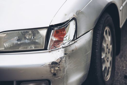 Car damage on road accident - car insurance concept