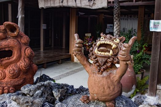 Shisa statues protecting a residence on Taketomi island, Japan.