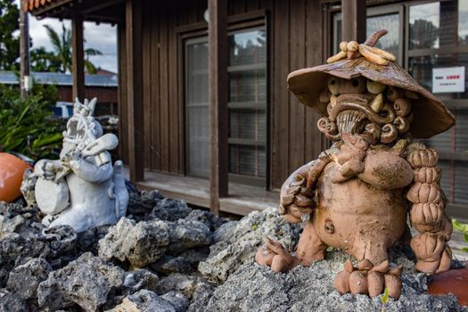 Shisa statues protecting a residence on Taketomi island, Japan.