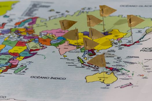 Colored pinpoint map with flags as signs of countries visited