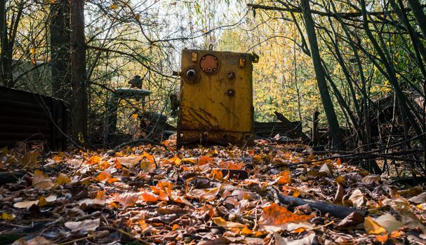 contaminated equipment dump in the Chernobyl forest Ukraine in autumn