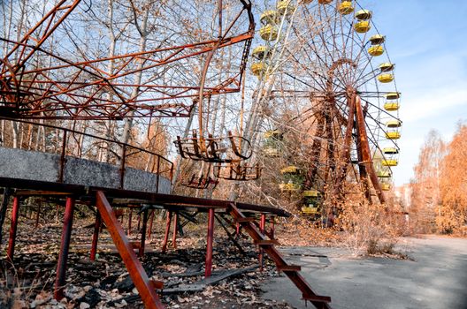 carousel wheel in an abandoned amusement park in Chernobyl Ukraine in autumn