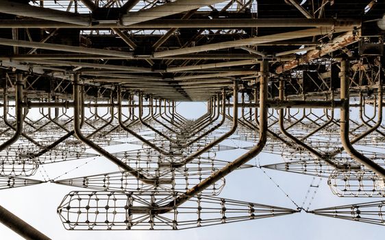 old secret army soviet radar on a background of blue sky and clouds in Chernobyl Ukraine