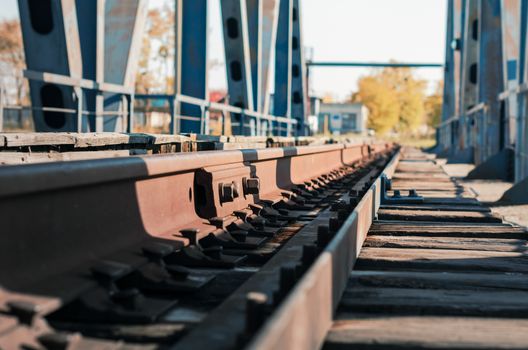 old railway on the bridge in Chernobyl Ukraine close up