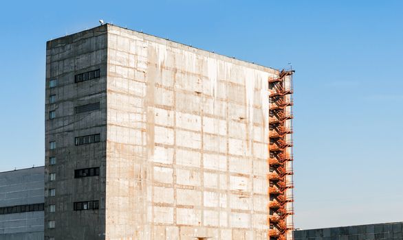 tall old nuclear waste storage building in Chernobyl Ukraine