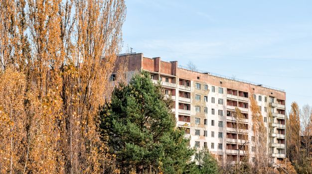 old empty big house on the street of the abandoned city Chernobyl Ukraine in autumn