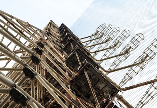 huge high secret army military antenna against the blue sky in Chernobyl Ukraine
