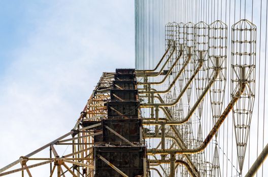huge secret military army radar against the blue sky and clouds in Chernobyl Ukraine