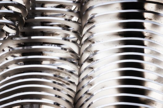 abstract background smooth curved lines metal construction close up