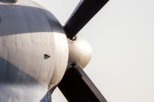 background fragment of a propeller blade of a vintage airplane isolated closeup