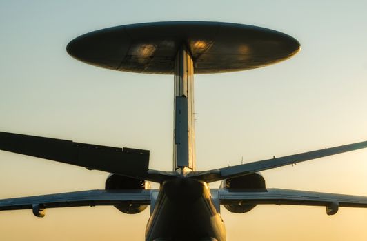 silhouette russian army reconnaissance large plane with a round antenna in isolation