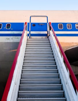 gangway of an old civilian airliner in perspective close up