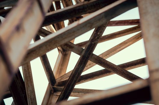 background of metal beams of industrial building closeup
